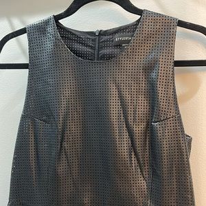 Black faux leather dress.